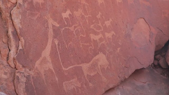 Rock cravings petroglyphs at Twyfelfontein in Damaraland Namibia