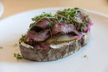 Tasty sandwich on the plate in cafe
