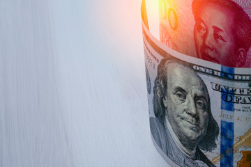 US dollar and China Yuan banknote  on white background. Its is symbol for tariff trade war crisis...