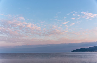 Mirror Still Mediterranean Sea on the Southern Italian Coast at Sunrise