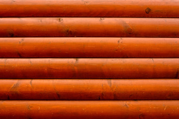 Modern wall of siding, texture of dark brown color.