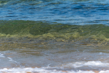 Waves Washing Ashore on a Mediterranean Beach