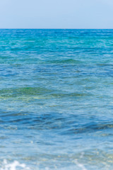 Obraz premium Waves Washing Ashore on a Mediterranean Beach