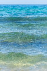 Fototapeta na wymiar Waves Washing Ashore on a Mediterranean Beach