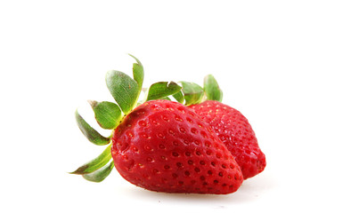 Close-Up Of Strawberry Over White Background