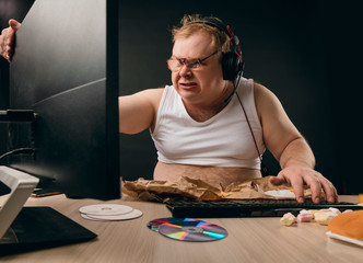 frustrated man feels angry as his favourite team has lost the game. close up photo. anger, madness, TV, computer addiction concept