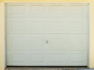 White garage door outdoor design.