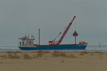 Fototapeta na wymiar cargo ship in the port