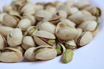 pistachios on white background