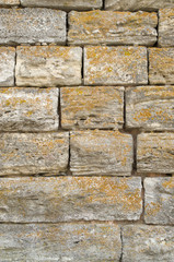 Old relief limestone wall closeup