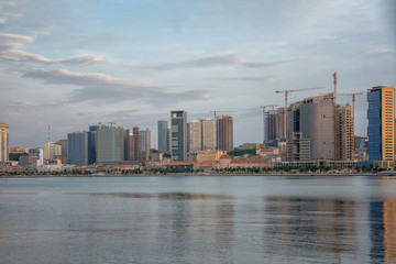 Fototapeta premium Luanda bay and seaside promenade at sunset, Marginal of Luanda capital city of Angola- skyline