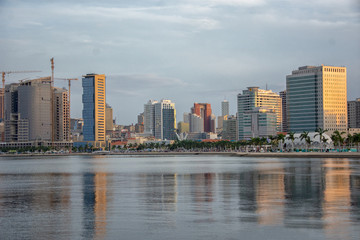 Fototapeta na wymiar Luanda bay and seaside promenade at sunset, Marginal of Luanda capital city of Angola- skyline