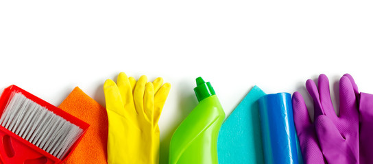 Cleaning products set of rainbow colors isolated on white background. Spring cleaning concept. Top...