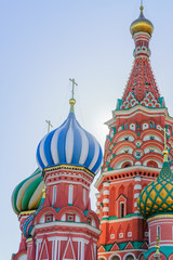 Fototapeta na wymiar St Basil's cathedral on Red Square in Moscow. Domes the cathedral lit by the sun..