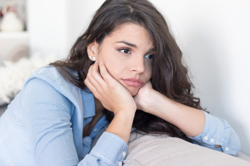 Portrait of unhappy lonely depressed young woman 