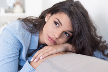 Portrait of unhappy lonely depressed young woman 