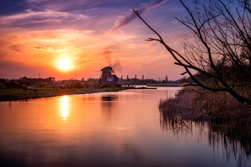 Fototapeta premium Windmill at sunset