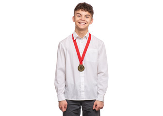 Happy winner. Portrait of Handsome Teen Boy Student with gold Medal. Child in white shirt celebrating his success, isolated on white background. Back to School concept.