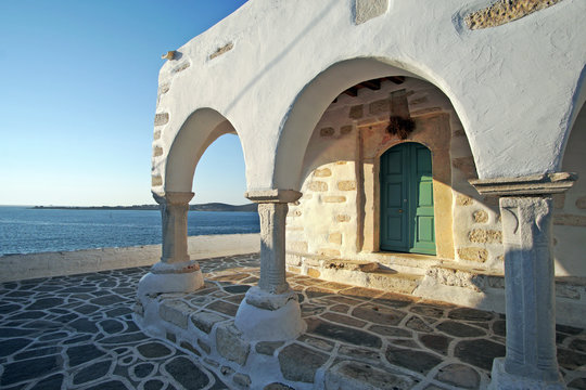 The church of Agios Konstantinou, a traditional cycladic church with blue dome in the town of Paroikia