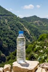 A bottle of water on a sunny day