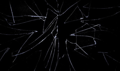 Broken glass texture and background, isolated on black, cracked window effect, clipping path  