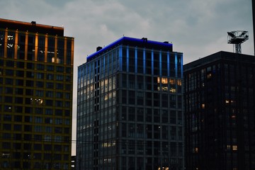 Fototapeta na wymiar night silhouette three panel buildings 