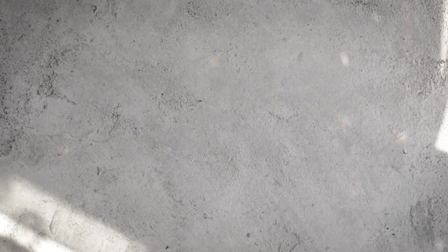 Top down view of grey, concrete texture.