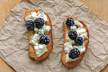 Keto sandwich with blue cheese and blackberry. Healthy breakfast or snack.