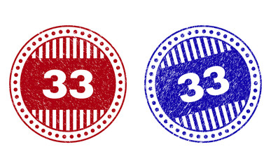 Grunge 33 round stamp seals isolated on a white background. Round seals with grunge texture in red and blue colors. Vector rubber imitation of 33 caption inside circle form with stripes. - obrazy, fototapety, plakaty