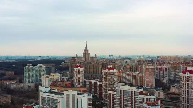 Aerial video in Moscow on Mosfilmovskaya street. Drone flies over residential areas. Overlooking the Moscow State University (MSU).