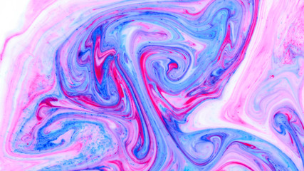 Abstract multicolored background. Screen saver. Fluid art with pink blue color. Blue pink texture. Colored paint stains in liquid