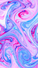 Abstract multicolored background. Screen saver. Fluid art with pink blue color. Blue pink texture. Colored paint stains in liquid