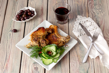 Piece of pork on a white plate