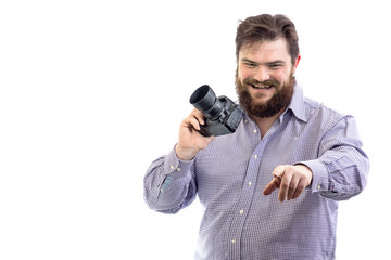 portrait of big handsome bearded photographer taking photo with professional DSLR camera, isolated on white