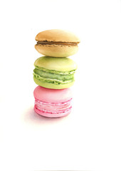 Multicolored watercolor macarons on white background
