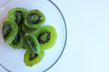 Fototapeta na wymiar Dried kiwi fruit vegan hand food