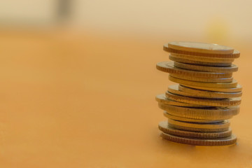 Baht with light brown blurred background