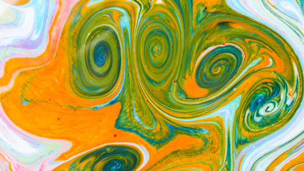Fluid art with different colors. Screen saver. Multicolored background from paints on liquid....
