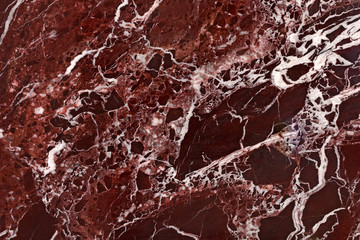 Obraz na płótnie Canvas The finishing stone. The polished red marble. Texture.