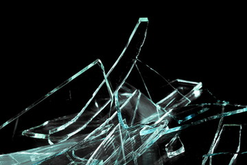 Broken glass pile pieces isolated on black background and texture, clipping path