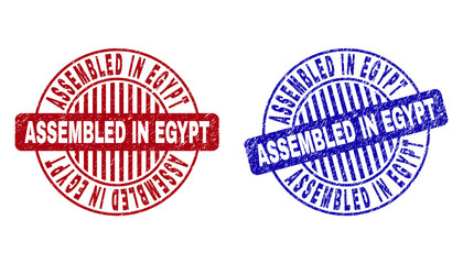 Grunge ASSEMBLED IN EGYPT round stamp seals isolated on a white background. Round seals with grunge texture in red and blue colors.