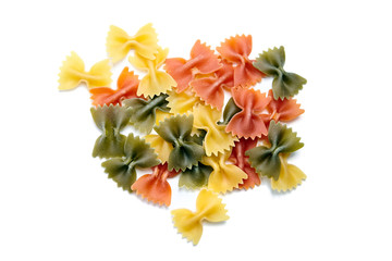 Farfalle tricolore. Heap of uncooked traditional italian pasta isolated on a white background