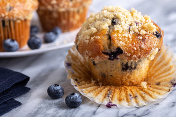 Blueberry Muffin With Berries on a Marble Surface - obrazy, fototapety, plakaty