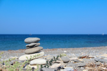 Fototapeta na wymiar Pebble beaches of the Aegean Sea on the island of Kos