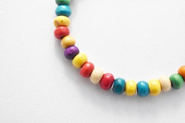 Wooden Beads Bracelet Rainbow Heart on White Background, Isolated Beads on White Background, Wooden Beads Bracelet, Jewelry making, Jewellery Design, Handmade Jewelry, Handmade Beads Bracelet