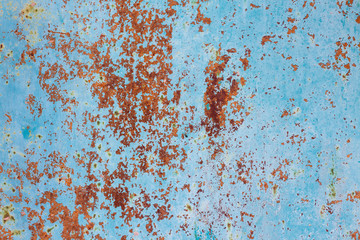 Old rusty metal background with cracked paint