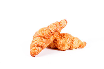 Croissant. Fresh and tasty croissants isolated on a white background closeup