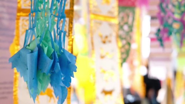 Thai paper cut handicraft art for festive decoration called "Tung"