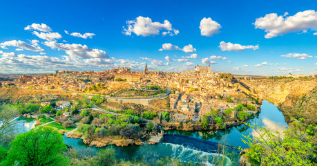 View of the historic city of Toledo with river Tagus, Spain. UNESCO world heritage site. - obrazy, fototapety, plakaty