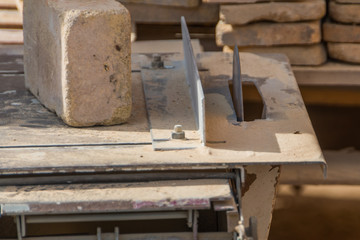 the working on the machine cuts the stone, laser disk